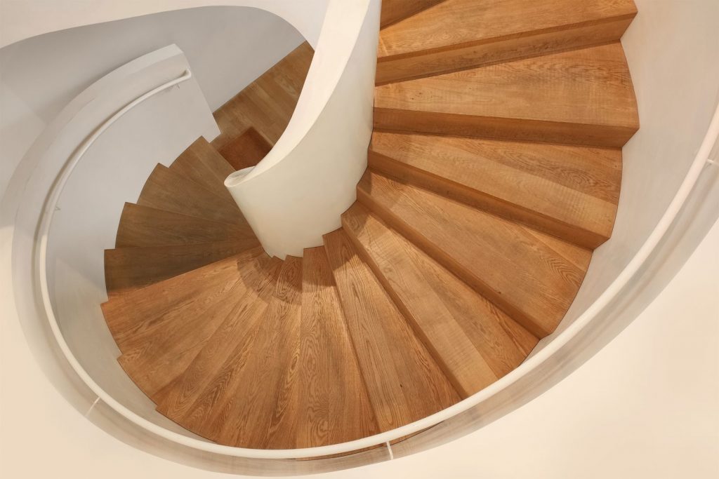 An image of a wooden spiral staircase
